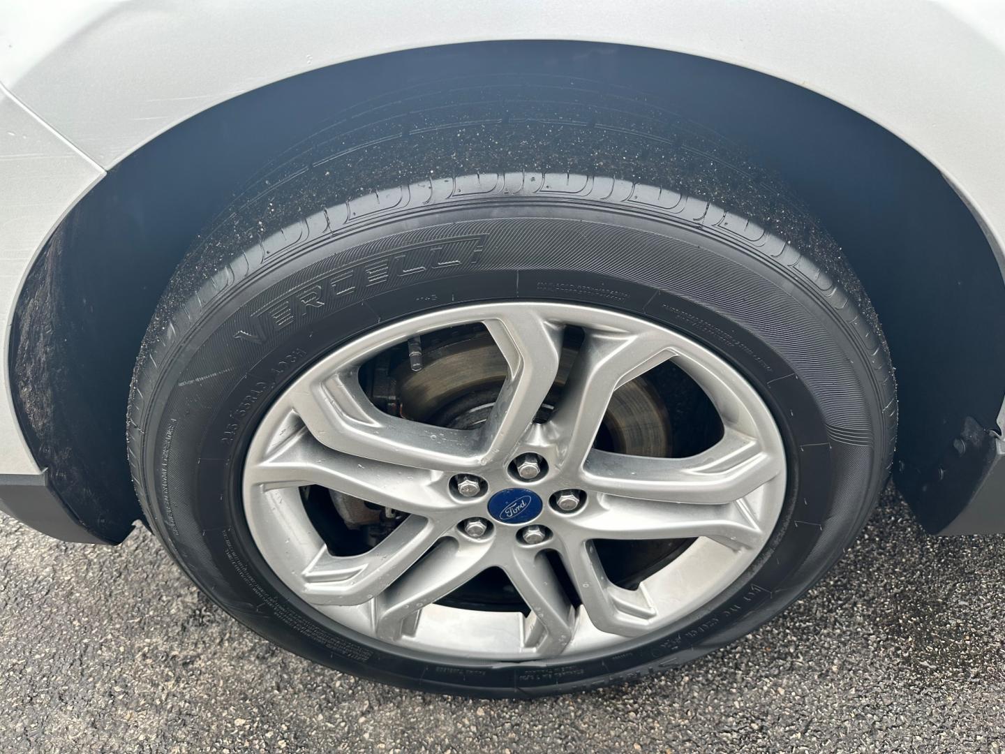 2017 Silver /Black Ford Edge Titanium (2FMPK4K92HB) with an 2.0L I4 DOHC 16V Turbo engine, 6-Speed Automatic transmission, located at 547 E. Main St., Orwell, OH, 44076, (440) 437-5893, 41.535435, -80.847855 - This 2017 Ford Edge Titanium AWD is a well-equipped midsize SUV. It comes with a powerful yet efficient 2.0L EcoBoost engine paired with a smooth 6-speed automatic transmission. Notable features include LED daytime running lights, dusk-sensing headlights, leather interior, auto-dimming rearview mirr - Photo#12